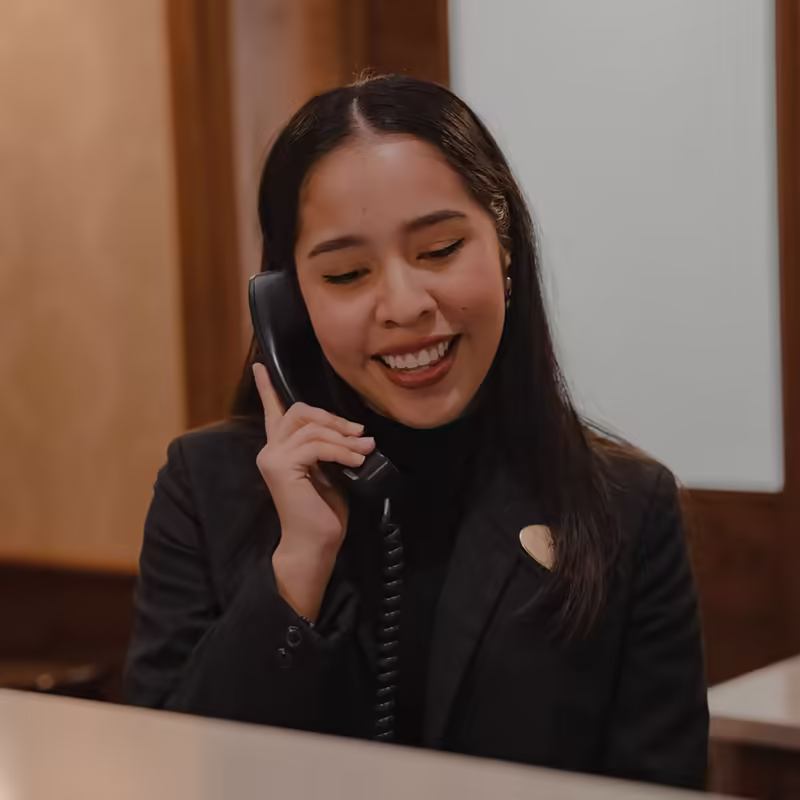 Front desk team member welcoming guests